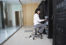 Technician Working in Server Room