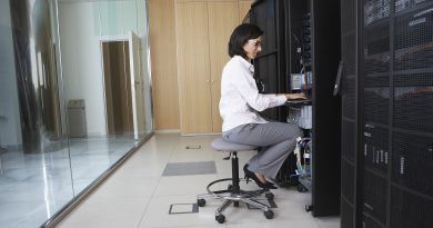 Technician Working in Server Room