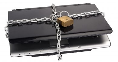 Laptop tied with chain and a padlock